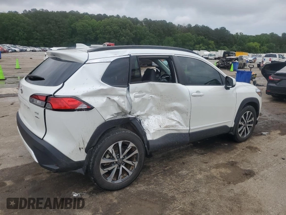 2023 Toyota Corolla Cross XLE with VIN 7MUDAABG3PV044005, listed as a Copart auction lot 54955225 with 50,712 mi miles and Salvage title. Bid and sale history available at DreamBid. Image 3.