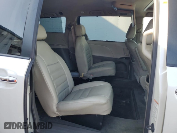 2015 Toyota Sienna XLE with VIN 5TDYK3DC0FS679812, listed as a Copart auction lot 61600775 with 118,483 mi miles and Salvage title. Bid and sale history available at DreamBid. Image 11.