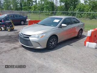 2016 Toyota Camry XLE with VIN 4T1BF1FKXGU259860, listed as a IAAI auction lot 42219507 with 239,145 mi miles and . Bid and sale history available at DreamBid. Image 2.
