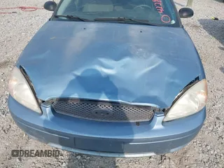 2006 Ford Taurus SE z VIN 1FAFP53U96A241825, wystawiony jako IAAI lot #42286654 z przebiegiem 205 136 mil mil oraz . Historia ofert i sprzedaży dostępna na DreamBid. Obrazek 6.