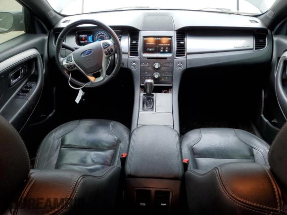 2015 Ford Taurus SEL with VIN 1FAHP2H87FG145689, listed as a Copart auction lot 56294115 with 81,029 mi miles and Salvage title. Bid and sale history available at DreamBid. Image 8.