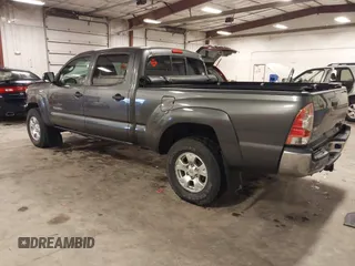 2013 Toyota Tacoma with VIN 3TMMU4FN9DM052987, listed as a IAAI auction lot 42325979 with 200,379 mi miles and . Bid and sale history available at DreamBid. Image 3.