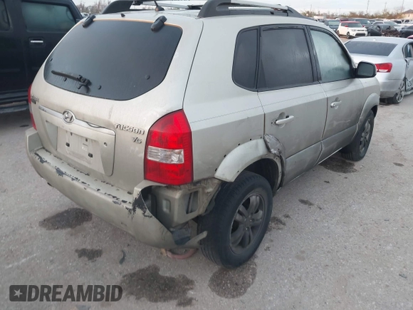 2007 Hyundai Tucson SE with VIN KM8JN12D77U539841, listed as a IAAI auction lot 41777599 with 126,958 mi miles. Bid and sale history available at carsss.com. Image 4.