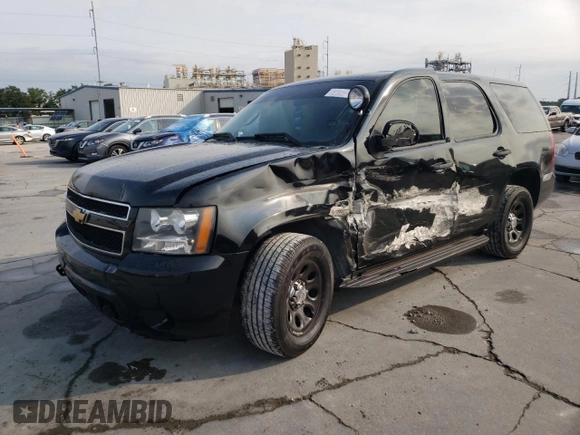 2013 Chevrolet Tahoe Commercial with VIN 1GNLC2E00DR304026, listed as a Copart auction lot 57041135 with 125,087 mi miles and Salvage title. Bid and sale history available at DreamBid. Image 1.