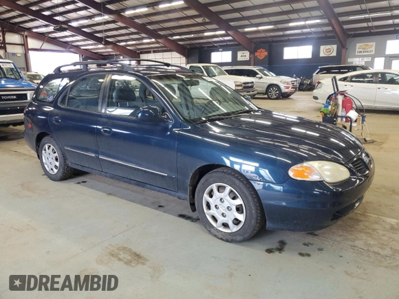 2000 Hyundai Elantra z VIN KMHJW35F5YU181324, wystawiony jako Copart lot #48016775 z przebiegiem 79 686 mil mil oraz Czysty tytuł • Clean title. Historia ofert i sprzedaży dostępna na DreamBid. Obrazek 4.