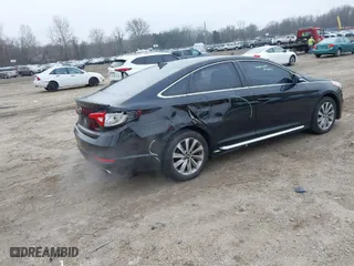 2015 Hyundai Sonata 2.4L Sport with VIN 5NPE34AF7FH074244, listed as a IAAI auction lot 41063318 with 111,227 mi miles. Bid and sale history available at carsss.com. Image 4.
