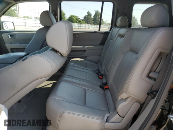 2011 Honda Pilot EX-L z VIN 5FNYF4H62BB036018, wystawiony jako Copart lot #58846165 z przebiegiem 199 116 mil mil oraz Szkoda całkowita • Salvage title. Historia ofert i sprzedaży dostępna na DreamBid. Obrazek 11.