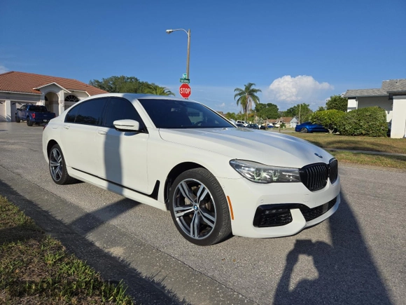 2017 BMW 7 Series 740i with VIN WBA7E2C54HG740427, listed as a Copart auction lot 54992345 with 93,252 mi miles and Clean Title. Bid and sale history available at carsss.com. Image 1.