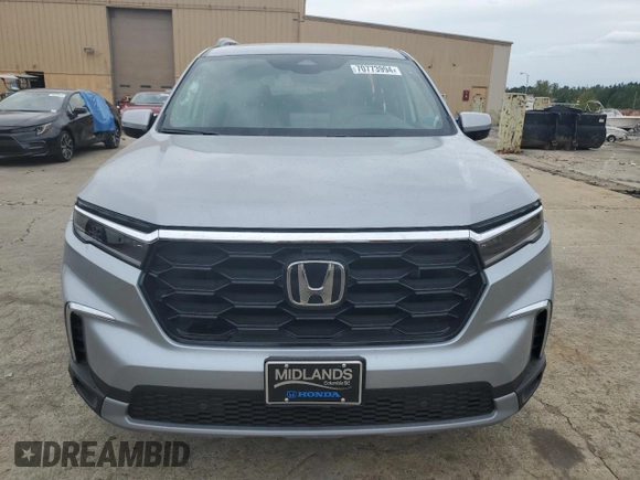 2024 Honda Pilot Touring with VIN 5FNYG1H76RB031855, listed as a Copart auction lot 70773994 with 3,618 mi miles and Salvage Title. Bid and sale history available at carsss.com. Image 5.