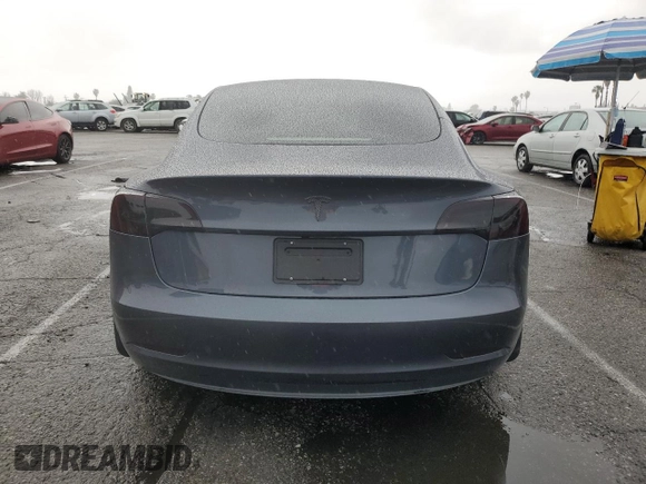2023 Tesla Model 3 with VIN 5YJ3E1EA5PF640805, listed as a Copart auction lot 48389265 with 28,193 mi miles and Salvage title. Bid and sale history available at DreamBid. Image 6.