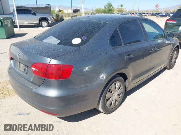 2013 Volkswagen Jetta S with VIN 3VW2K7AJ0DM217194, listed as a IAAI auction lot 42057811 with 125,572 mi miles and . Bid and sale history available at DreamBid. Image 4.