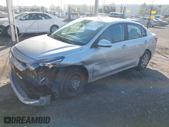 2023 Kia Rio LX with VIN 3KPA24AD1PE599290, listed as a IAAI auction lot 41023283 with 10,027 mi miles and . Bid and sale history available at DreamBid. Image 2.
