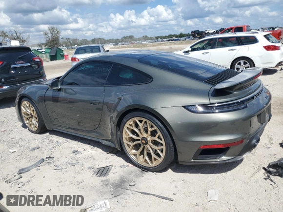 2023 Porsche 911 Turbo with VIN WP0AD2A99PS258016, listed as a Copart auction lot 72852814 with 7,386 mi miles and Salvage Title. Bid and sale history available at carsss.com. Image 2.