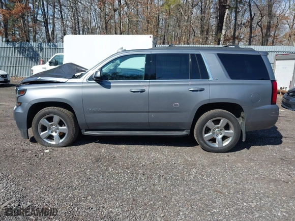 2019 Chevrolet Tahoe LT with VIN 1GNSKBKC0KR121493, listed as a IAAI auction lot 41656734 with 163,994 mi miles. Bid and sale history available at carsss.com. Image 14.