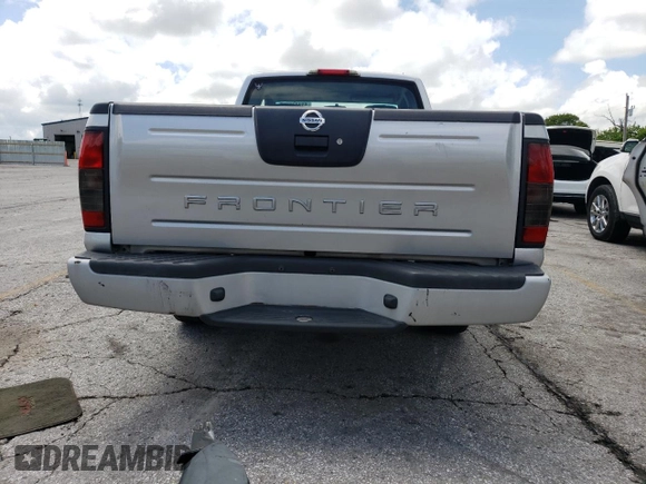 2004 Nissan Frontier XE with VIN 1N6DD26T34C454425, listed as a Copart auction lot 52404115 with 317,899 mi miles and Salvage title. Bid and sale history available at DreamBid. Image 6.