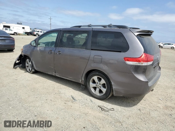 2014 Toyota Sienna LE AAS with VIN 5TDKK3DC6ES491574, listed as a Copart auction lot 59815785 with 189,975 mi miles and Salvage title. Bid and sale history available at DreamBid. Image 2.