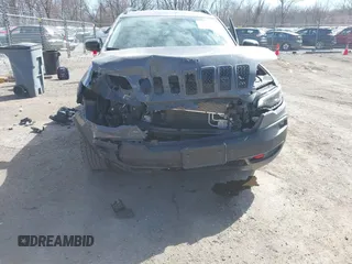 2022 Jeep Cherokee Trailhawk with VIN 1C4PJMBX5ND541929, listed as a IAAI auction lot 41815823 with 68,112 mi miles and . Bid and sale history available at DreamBid. Image 6.