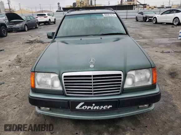 1993 Mercedes-Benz 300 with VIN WDBEA92E7PF259851, listed as a Copart auction lot 50561015 with 214,346 mi miles and Salvage Title. Bid and sale history available at DreamBid. Image 5.