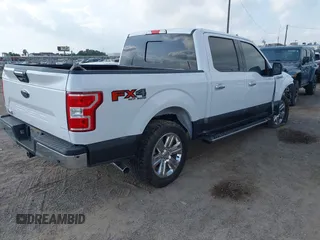 2019 Ford F-150 XL z VIN 1FTEW1E50KKE04180, wystawiony jako IAAI lot #42421022 z przebiegiem 73 912 mil mil oraz . Historia ofert i sprzedaży dostępna na DreamBid. Obrazek 4.