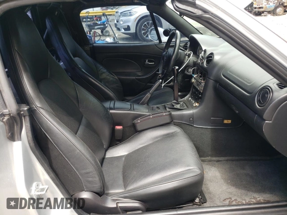 2004 Mazda MX-5 Miata LS with VIN JM1NB353640400140, listed as a Copart auction lot 56127165 with 123,276 mi miles and Salvage title. Bid and sale history available at DreamBid. Image 10.
