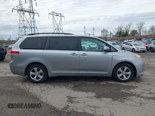 2012 Toyota Sienna LE AAS with VIN 5TDKK3DC9CS227584, listed as a IAAI auction lot 41972758 with 258,077 mi miles. Bid and sale history available at carsss.com. Image 14.
