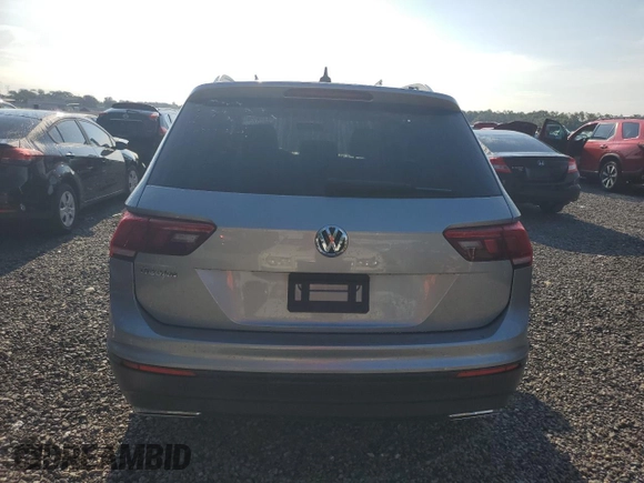 2021 Volkswagen Tiguan S with VIN 3VV1B7AX9MM023655, listed as a Copart auction lot 64159445 with 55,795 mi miles and Salvage title. Bid and sale history available at DreamBid. Image 6.