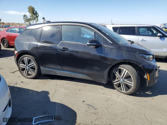 2018 BMW i3 with VIN WBY7Z2C5XJVE61932, listed as a Copart auction lot 72055694 with 0 mi miles and Salvage Title. Bid and sale history available at carsss.com. Image 4.
