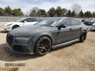 2016 Audi RS 7 Prestige z VIN WUAW2AFC2GN901494, wystawiony jako Copart lot #52958345 z przebiegiem 99 718 mil mil oraz Szkody całkowita. Historia ofert i sprzedaży dostępna na DreamBid. Obrazek 1.
