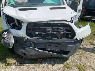 2017 Ford Transit z VIN 1FTYE1YMXHKA68114, wystawiony jako IAAI lot #42742955 z przebiegiem 245 470 mil mil oraz . Historia ofert i sprzedaży dostępna na DreamBid. Obrazek 27.