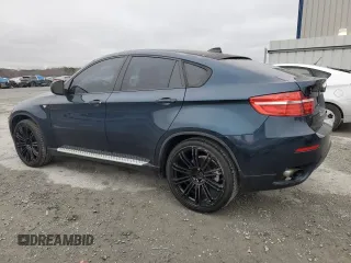 2014 BMW X6 xDrive35i with VIN 5UXFG2C57E0C43953, listed as a Copart auction lot 44595885 with 121,208 mi miles and Clean Title. Bid and sale history available at carsss.com. Image 2.
