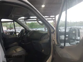 2015 Ford Transit Cargo z VIN 1FTNR2CM1FKA40154, wystawiony jako IAAI lot #42210986 z przebiegiem 164 324 mil mil oraz . Historia ofert i sprzedaży dostępna na DreamBid. Obrazek 5.