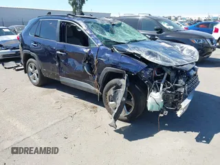 2019 Toyota RAV4 Hybrid Limited with VIN JTMDWRFV1KD014038, listed as a IAAI auction lot 42009941 with 100,640 mi miles and . Bid and sale history available at DreamBid. Image 1.