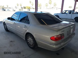 2001 Mercedes-Benz E-Class with VIN WDBJF65J81B215945, listed as a IAAI auction lot 41707410 with 227,668 mi miles. Bid and sale history available at carsss.com. Image 3.