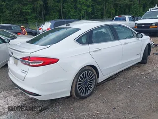 2018 Ford Fusion Titanium with VIN 3FA6P0RU9JR206923, listed as a IAAI auction lot 42522204 with Not provided miles and . Bid and sale history available at DreamBid. Image 4.
