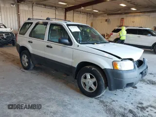 2003 Ford Escape XLS Popular with VIN 1FMYU02123KD48951, listed as a IAAI auction lot 41765772 with 208,796 mi miles. Bid and sale history available at carsss.com. Image 1.