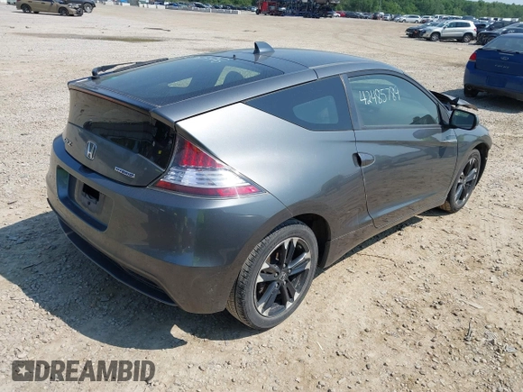 2015 Honda CR-Z with VIN JHMZF1D40FS003369, listed as a IAAI auction lot 42485789 with 145,052 mi miles and . Bid and sale history available at DreamBid. Image 4.