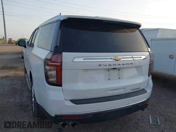 2022 Chevrolet Suburban Premier with VIN 1GNSCFKDXNR180648, listed as a IAAI auction lot 41853881 with 73,023 mi miles and . Bid and sale history available at DreamBid. Image 3.