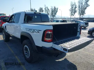 2022 Ram 1500 TRX with VIN 1C6SRFU93NN172647, listed as a IAAI auction lot 41539123 with 18,016 mi miles and . Bid and sale history available at DreamBid. Image 3.