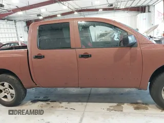 2007 Nissan Titan XE with VIN 1N6BA07A57N233449, listed as a IAAI auction lot 41381833 with 176,720 mi miles. Bid and sale history available at carsss.com. Image 14.