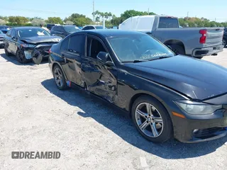 2015 BMW 3 Series 328i with VIN WBA3C1C58FK123489, listed as a IAAI auction lot 42026400 with 127,880 mi miles and . Bid and sale history available at carsss.com. Image 6.