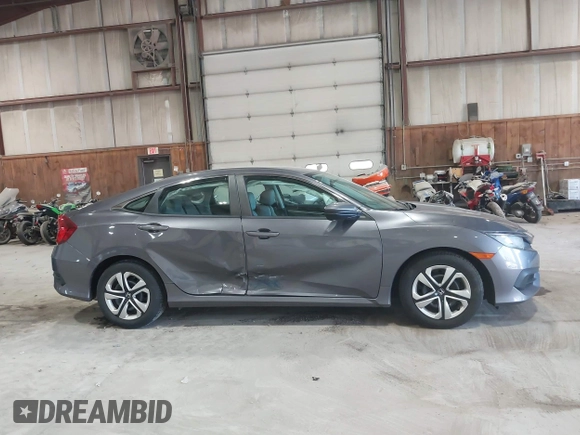 2016 Honda Civic Sedan LX with VIN 19XFC2F58GE214672, listed as a IAAI auction lot 42067792 with 73,929 mi miles. Bid and sale history available at carsss.com. Image 12.