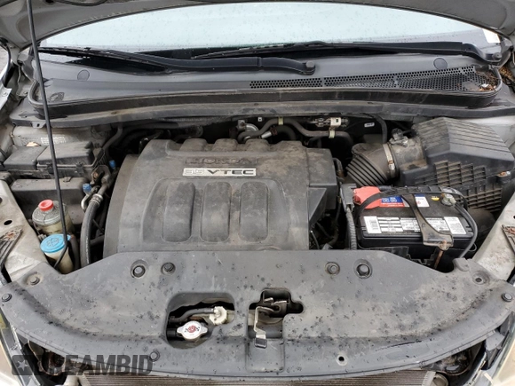 2010 Honda Odyssey LX z VIN 5FNRL3H20AB012805, wystawiony jako Copart lot #52243405 z przebiegiem 206 479 mil mil oraz Szkoda całkowita • Salvage title. Historia ofert i sprzedaży dostępna na DreamBid. Obrazek 14.