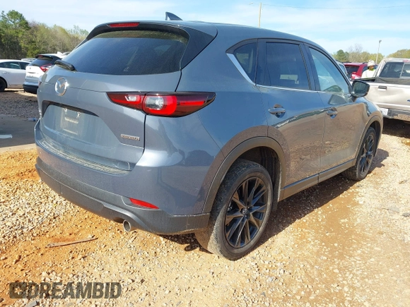 2023 Mazda CX-5 S Preferred with VIN JM3KFBCM3P0154043, listed as a IAAI auction lot 41928648 with 41,904 mi miles and . Bid and sale history available at carsss.com. Image 4.
