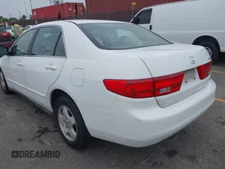 2005 Honda Accord LX with VIN 1HGCM56415A038655, listed as a IAAI auction lot 42565881 with 210,681 mi miles and . Bid and sale history available at DreamBid. Image 3.