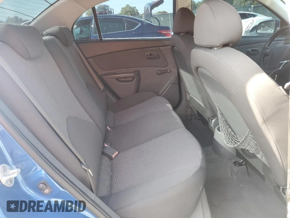 2009 Kia Rio LX with VIN KNADE223296515613, listed as a Copart auction lot 62008194 with 143,238 mi miles and Salvage Title. Bid and sale history available at carsss.com. Image 11.