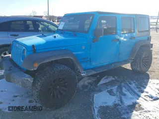 2018 Jeep Wrangler JK Unlimited Sport with VIN 1C4BJWDG6JL824178, listed as a IAAI auction lot 41420336 with 77,816 mi miles. Bid and sale history available at carsss.com. Image 2.