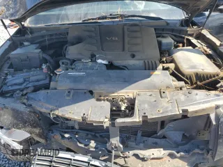 2011 Infiniti QX56 7-passenger with VIN JN8AZ2NE7B9006858, listed as a Copart auction lot 72564294 with 207,325 mi miles and Salvage Title. Bid and sale history available at carsss.com. Image 12.