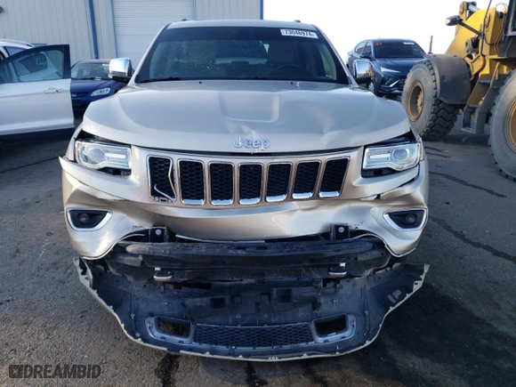 2014 Jeep Grand Cherokee Overland with VIN 1C4RJFCM2EC556953, listed as a Copart auction lot 73046974 with 106,889 mi miles and Salvage Title. Bid and sale history available at carsss.com. Image 5.