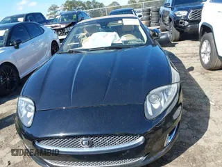 2014 Jaguar XK with VIN SAJWA4GB0ELB52358, listed as a IAAI auction lot 41832850 with 93,037 mi miles. Bid and sale history available at carsss.com. Image 13.