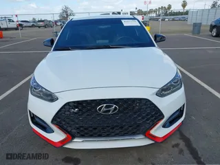 2019 Hyundai Veloster N with VIN KMHT36AH6KU001916, listed as a IAAI auction lot 41577775 with 77,471 mi miles. Bid and sale history available at carsss.com. Image 12.